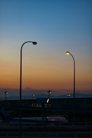 Close-up of a Skylumen map panel glowing with vibrant airport weather colors at dusk.