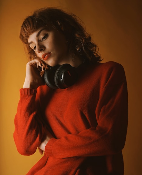 woman wearing red crew-neck sweatshirt