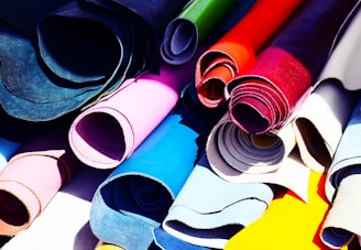 assorted-color rolled fabrics