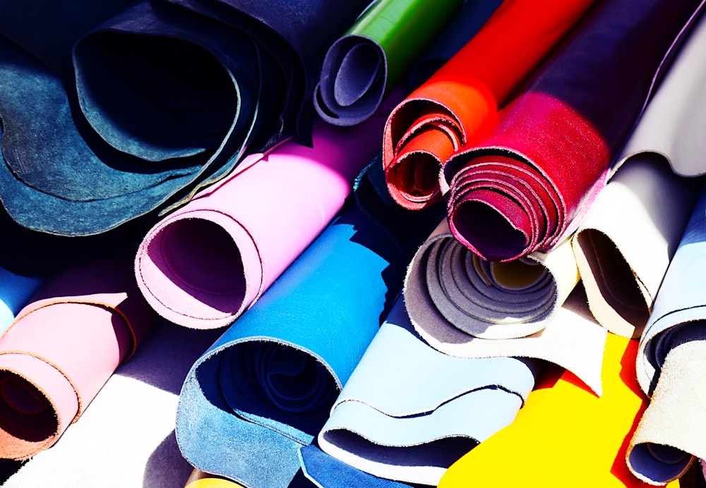 assorted-color rolled fabrics