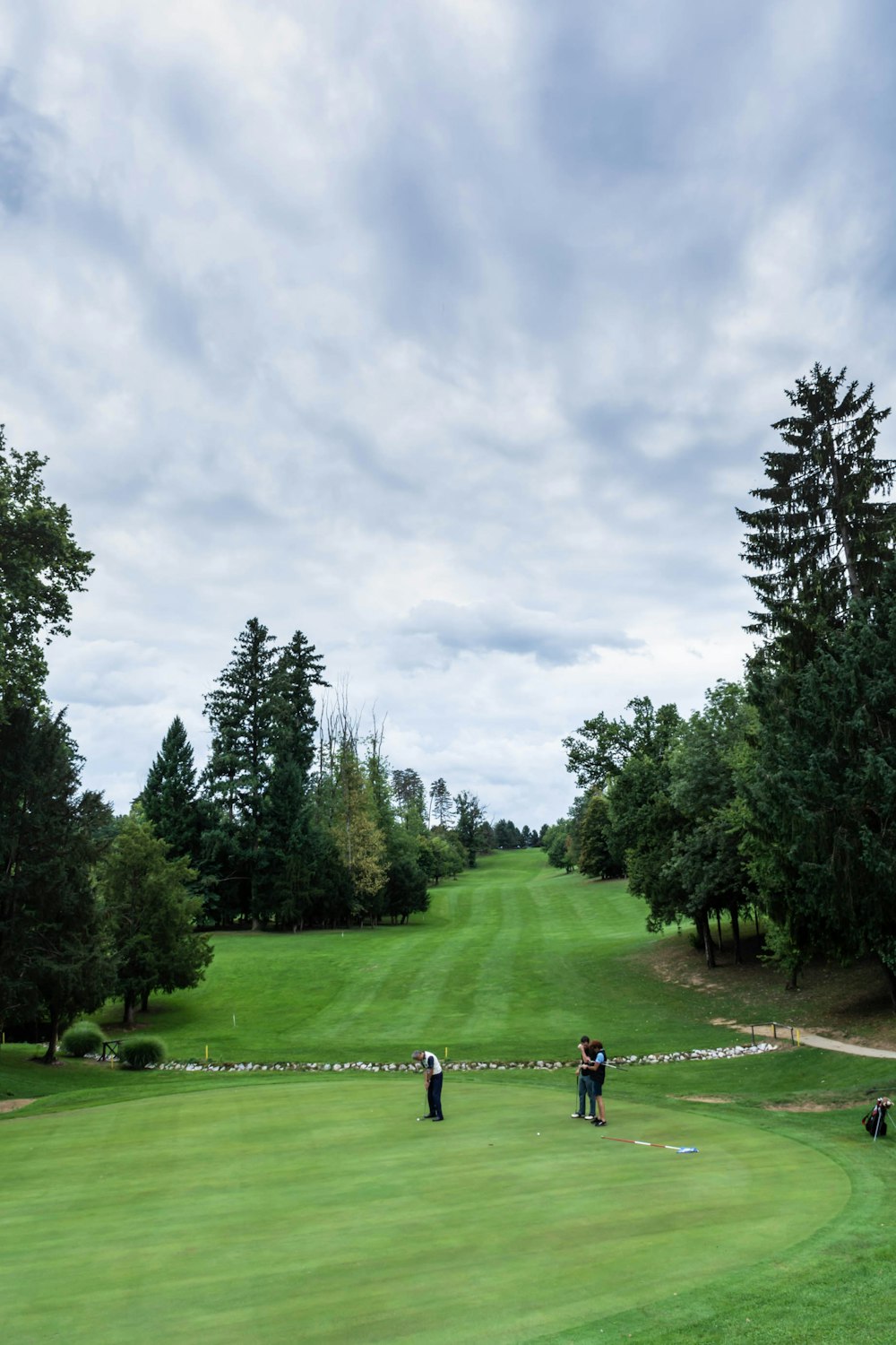 people on golf course