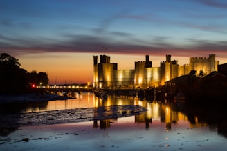 A majestic castle silhouette against a twilight sky, blending futuristic and medieval elements.