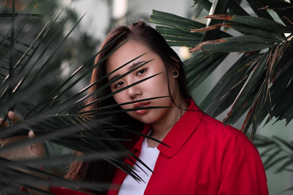 woman wearing red jacket