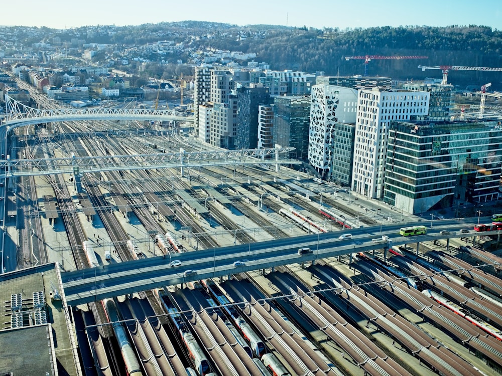 aerial photography of concrete building and bridge during daytime