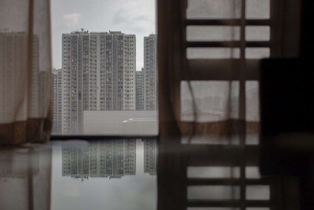 high rise buildings near body of water during daytime