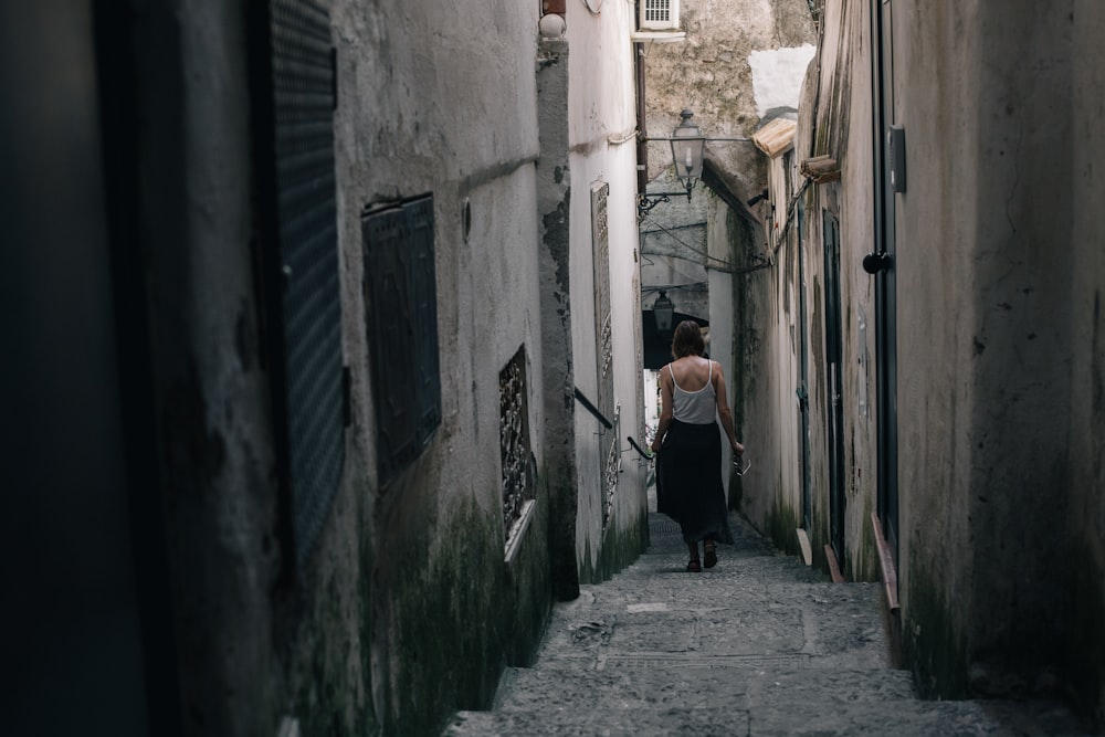 woman walking on concrete stairs