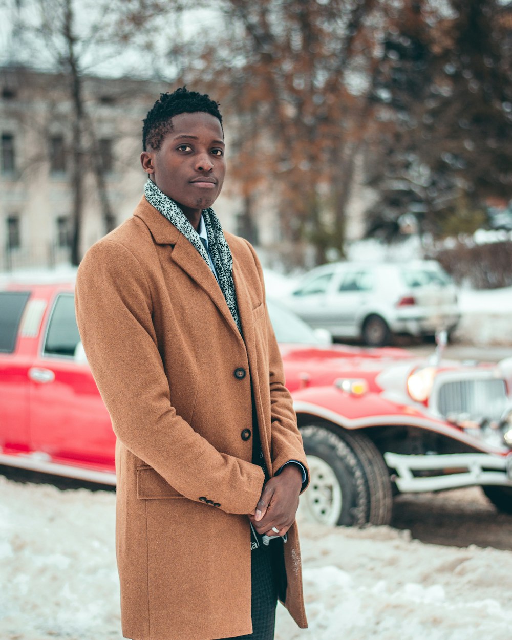 man wearing brown coat