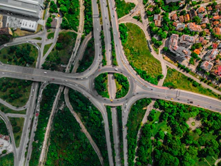 Aerial shot of the Outer Ring Road with traffic flowing smoothly near Narsingi plots.