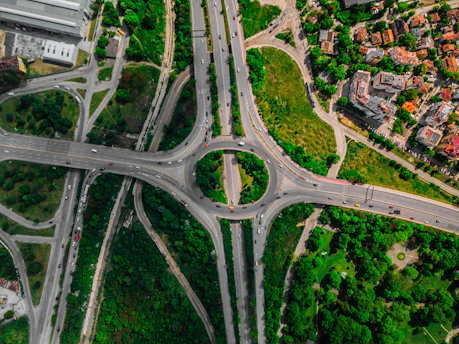 Aerial shot of the Outer Ring Road with traffic flowing smoothly near Narsingi plots.