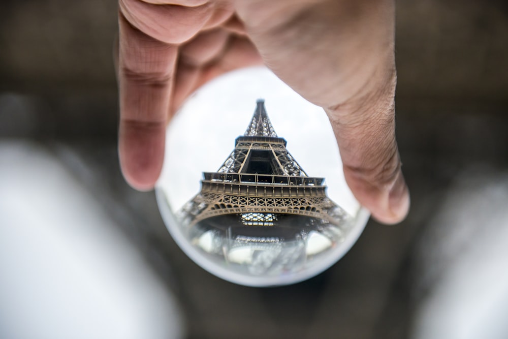 clear glass orb with Eiffel tower