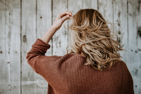 woman standing near board
