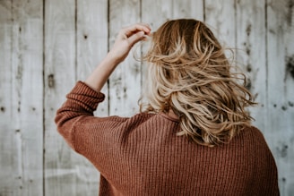 woman standing near board