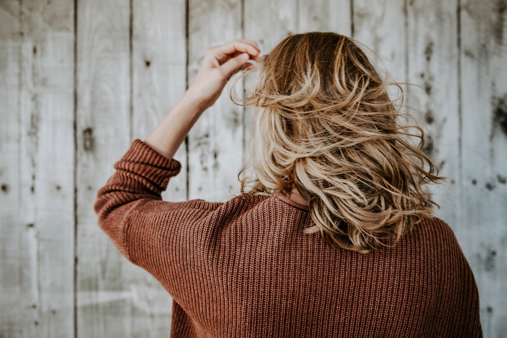 woman standing near board