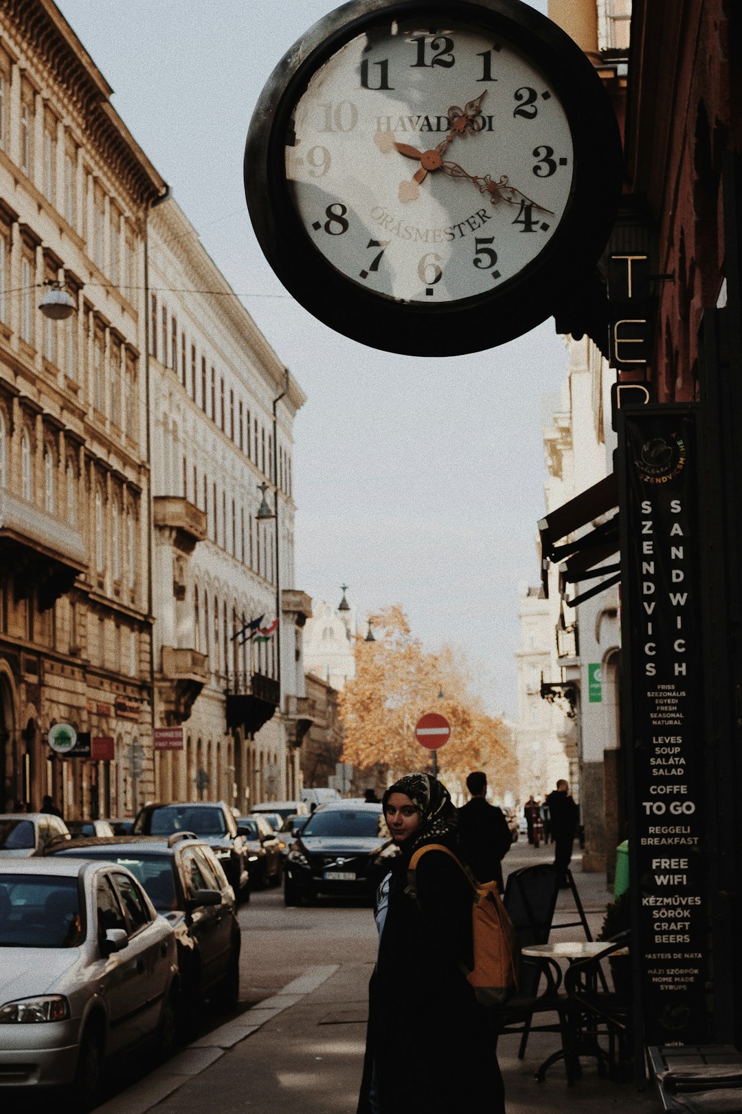 white and black analog street clock at 1:19