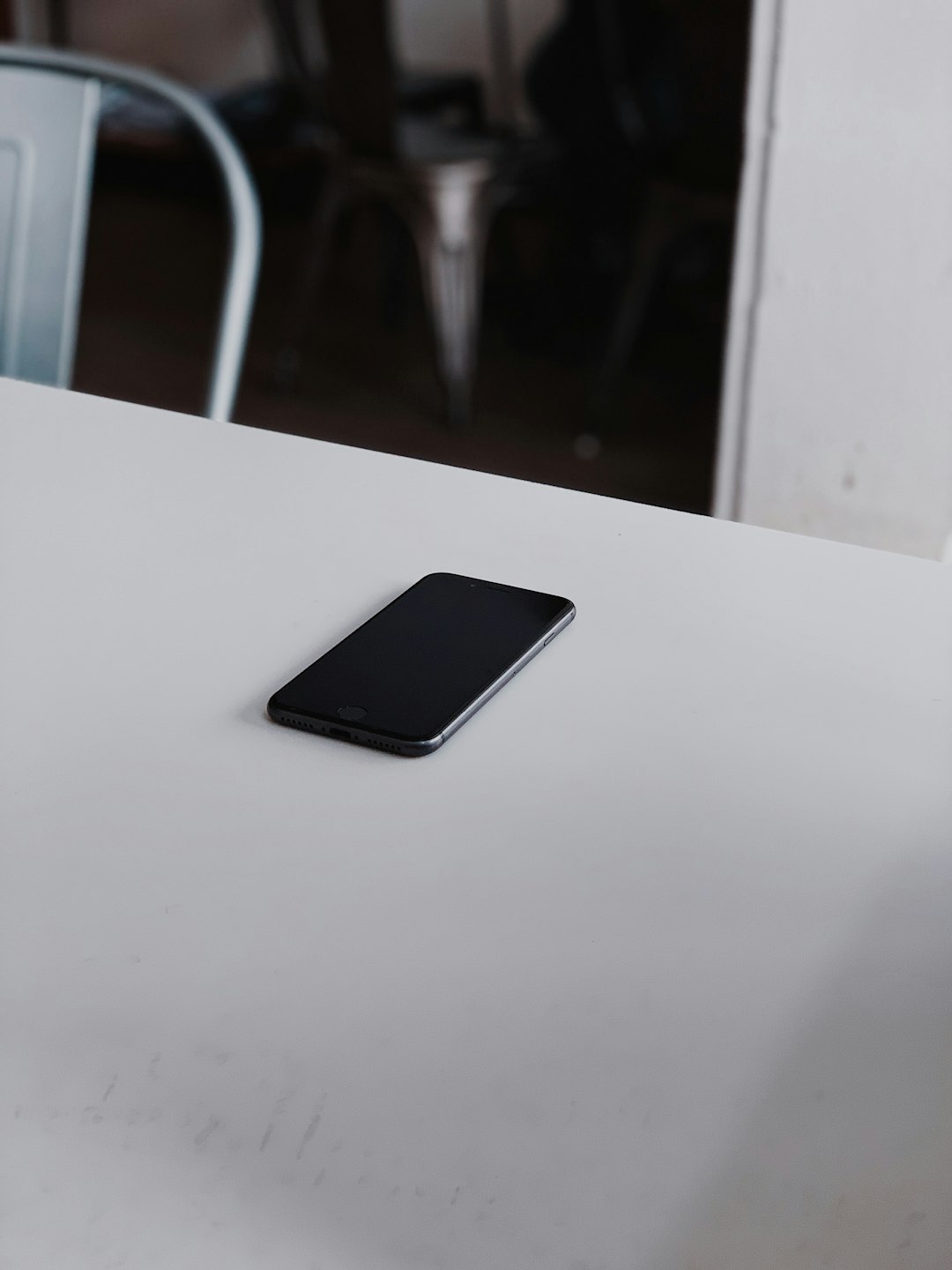 post-2014 iPhone on white table