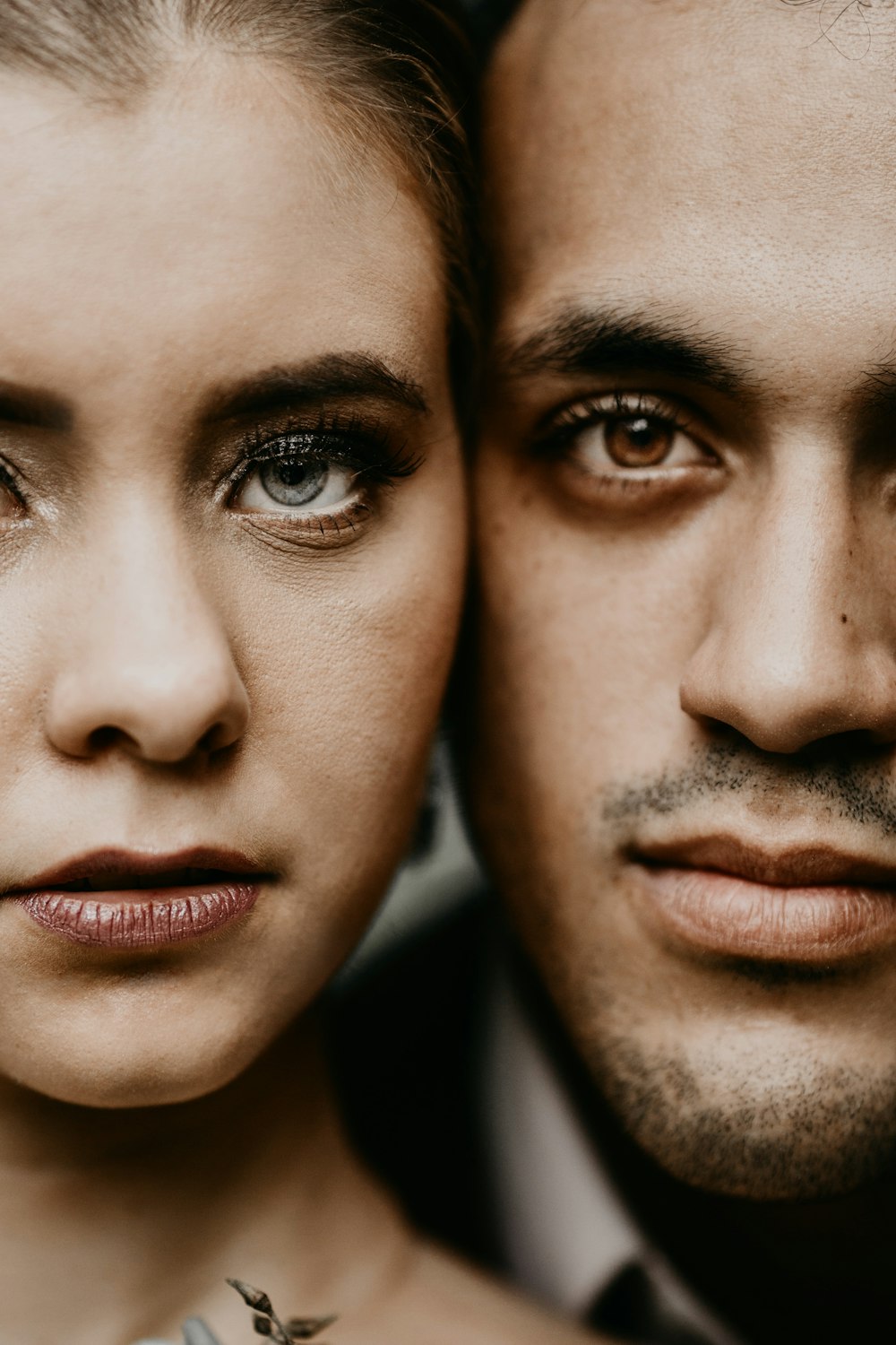 man and woman face close-up photography