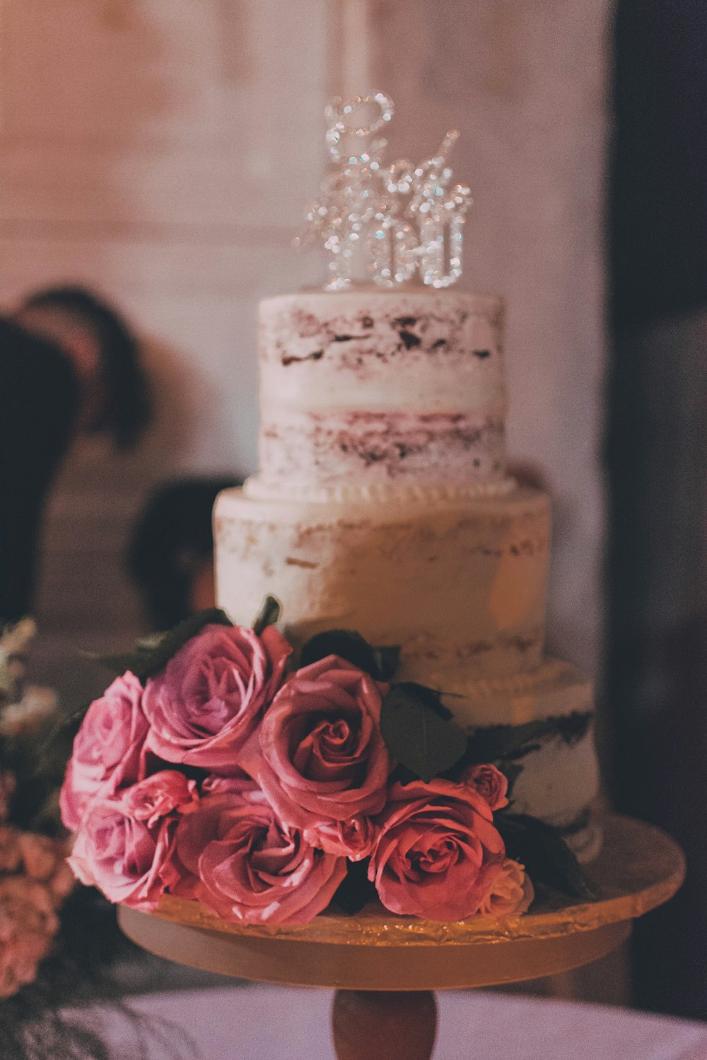 3-layer cake with rose accent