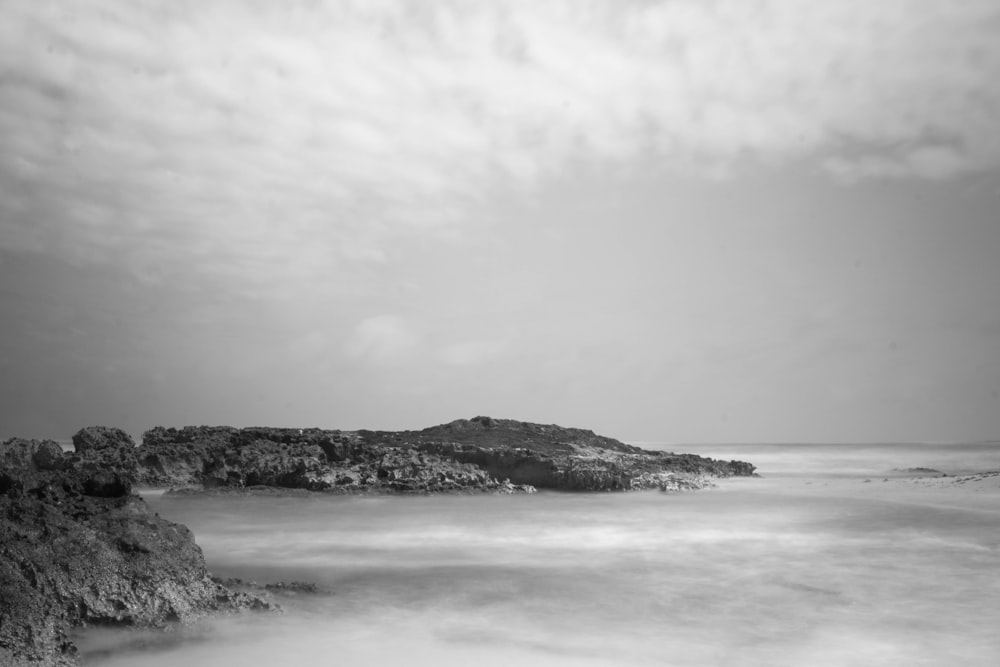 grayscale photo of body of water