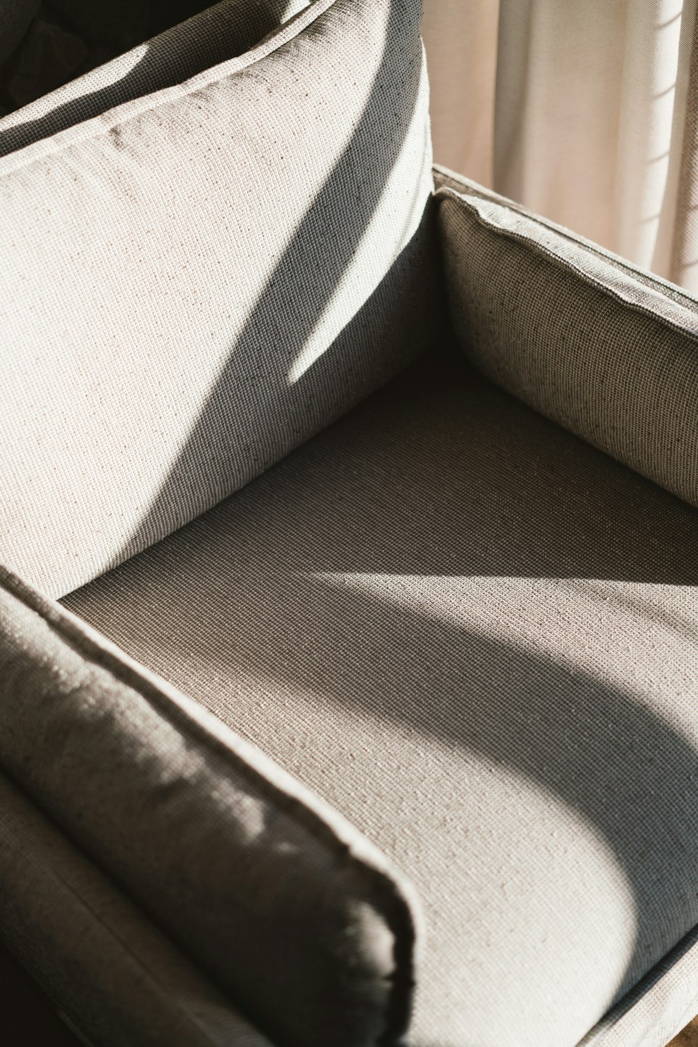 vacant gray fabric sofa armchair