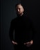man in black sweater