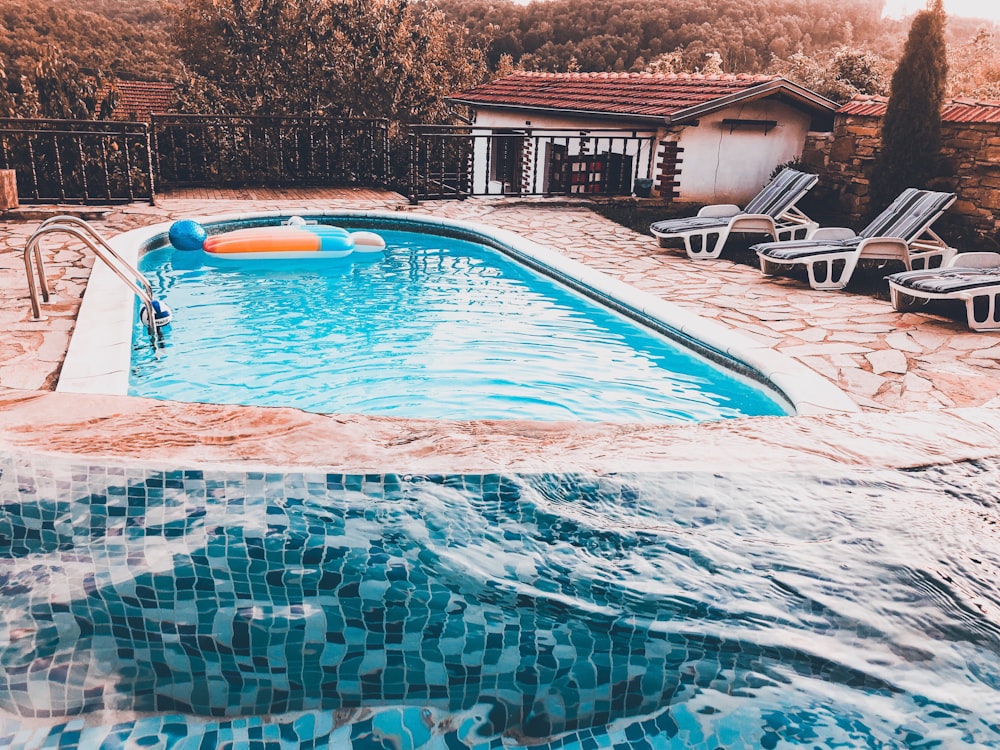 empty pool with loungers