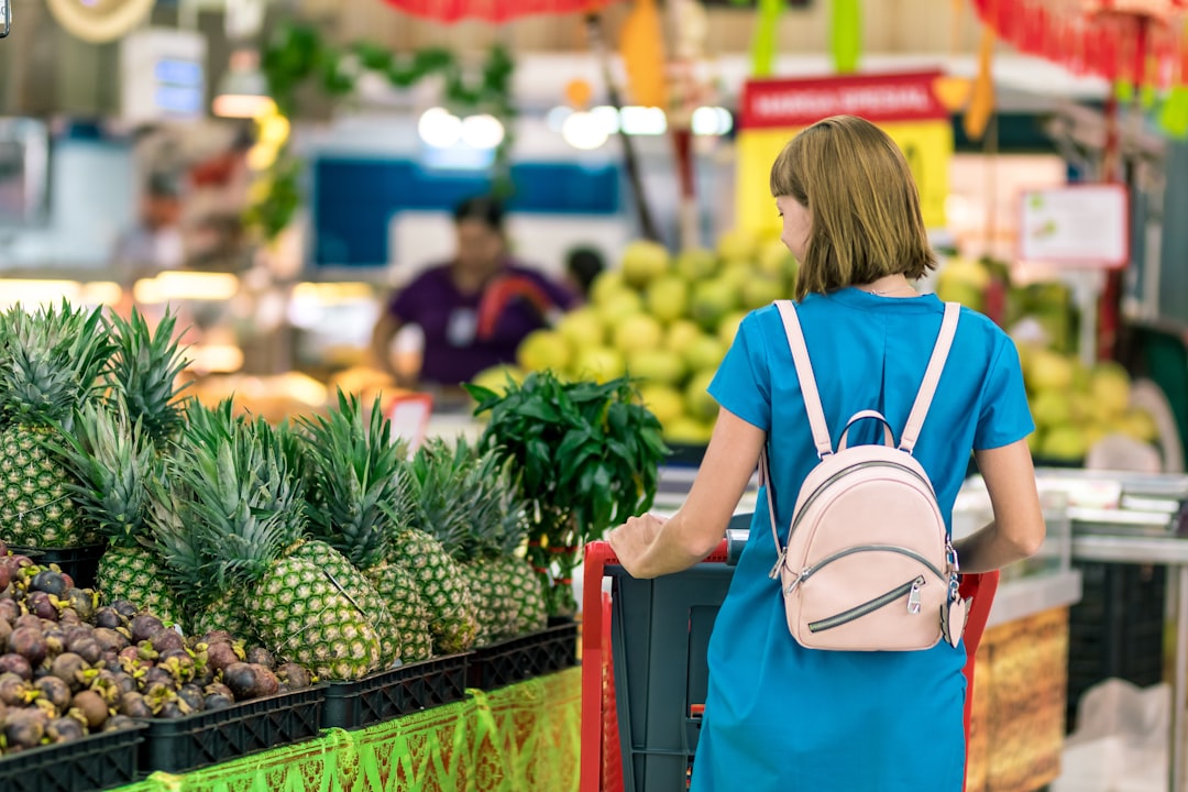 woman near fruits