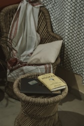 A cozy reading nook with a laptop open to the Fish n Chill blog, surrounded by ocean-themed decor.