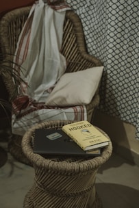 A cozy reading nook with a laptop open to the Fish n Chill blog, surrounded by ocean-themed decor.