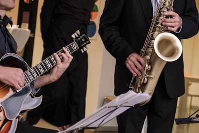 Close-up of musicians playing traditional Brazilian instruments.