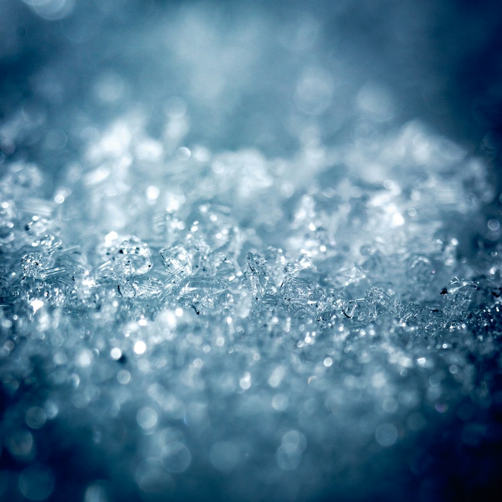 a close up of water droplets on a surface