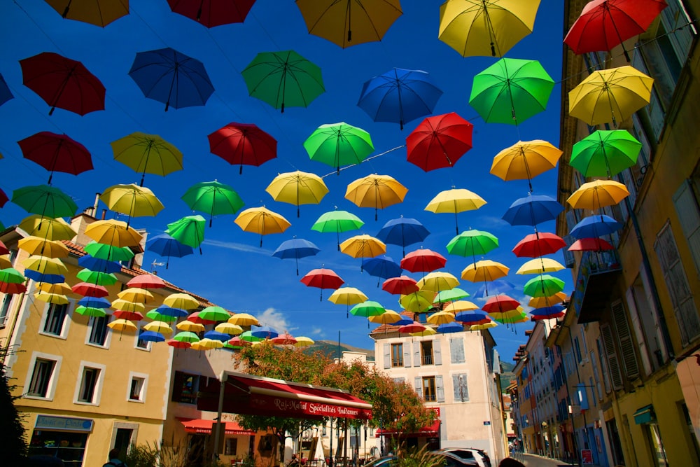 assorted umbrella above the street