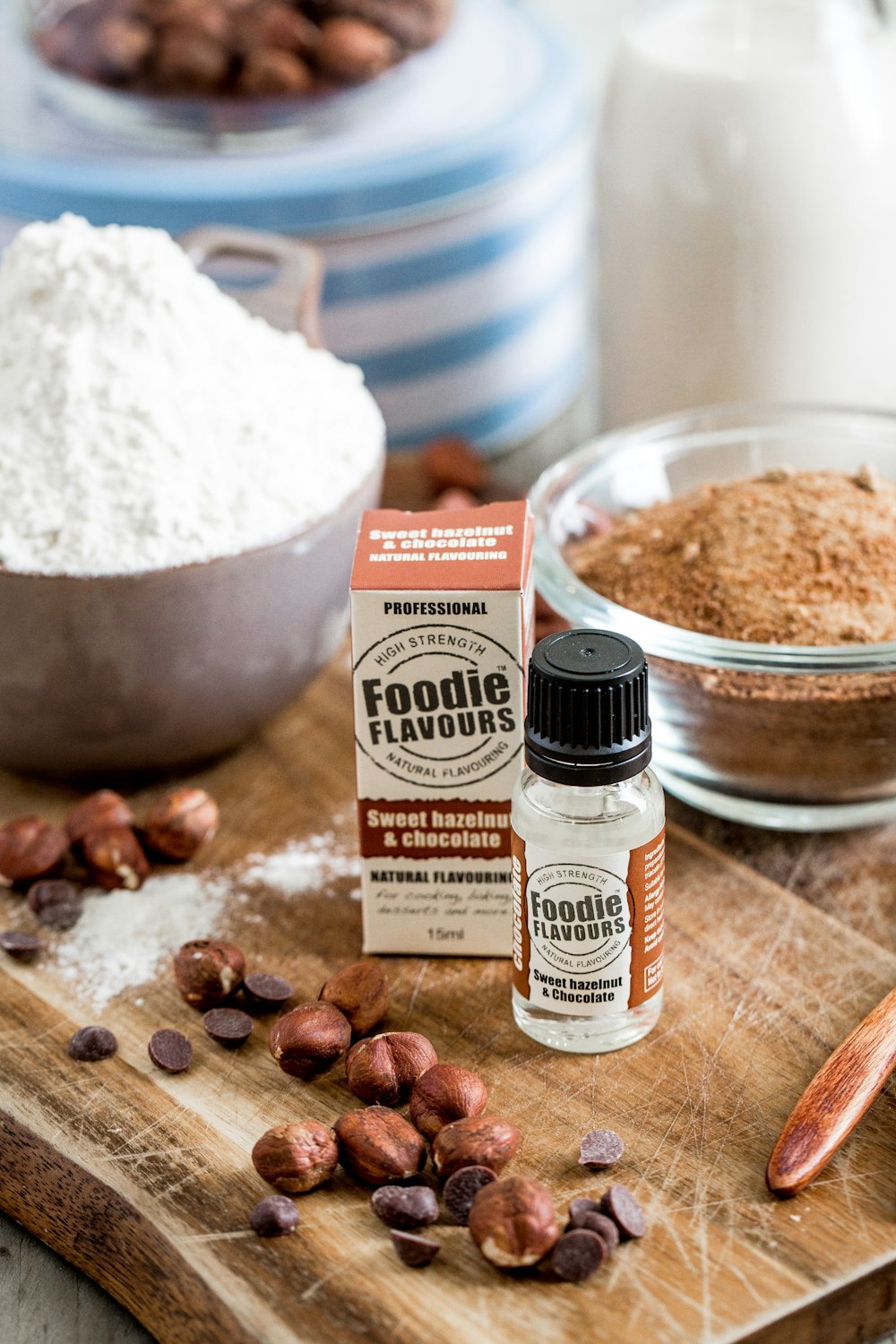 brown labeled bottle on brown chopping board