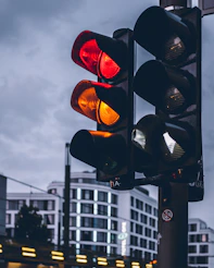 street traffic lights on red and orange