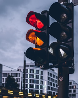 street traffic lights on red and orange