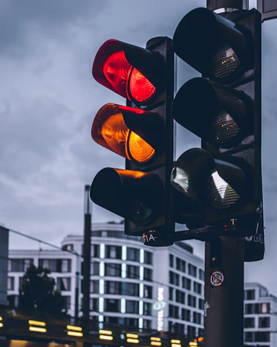 street traffic lights on red and orange