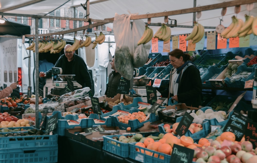 people in a market close-up photography