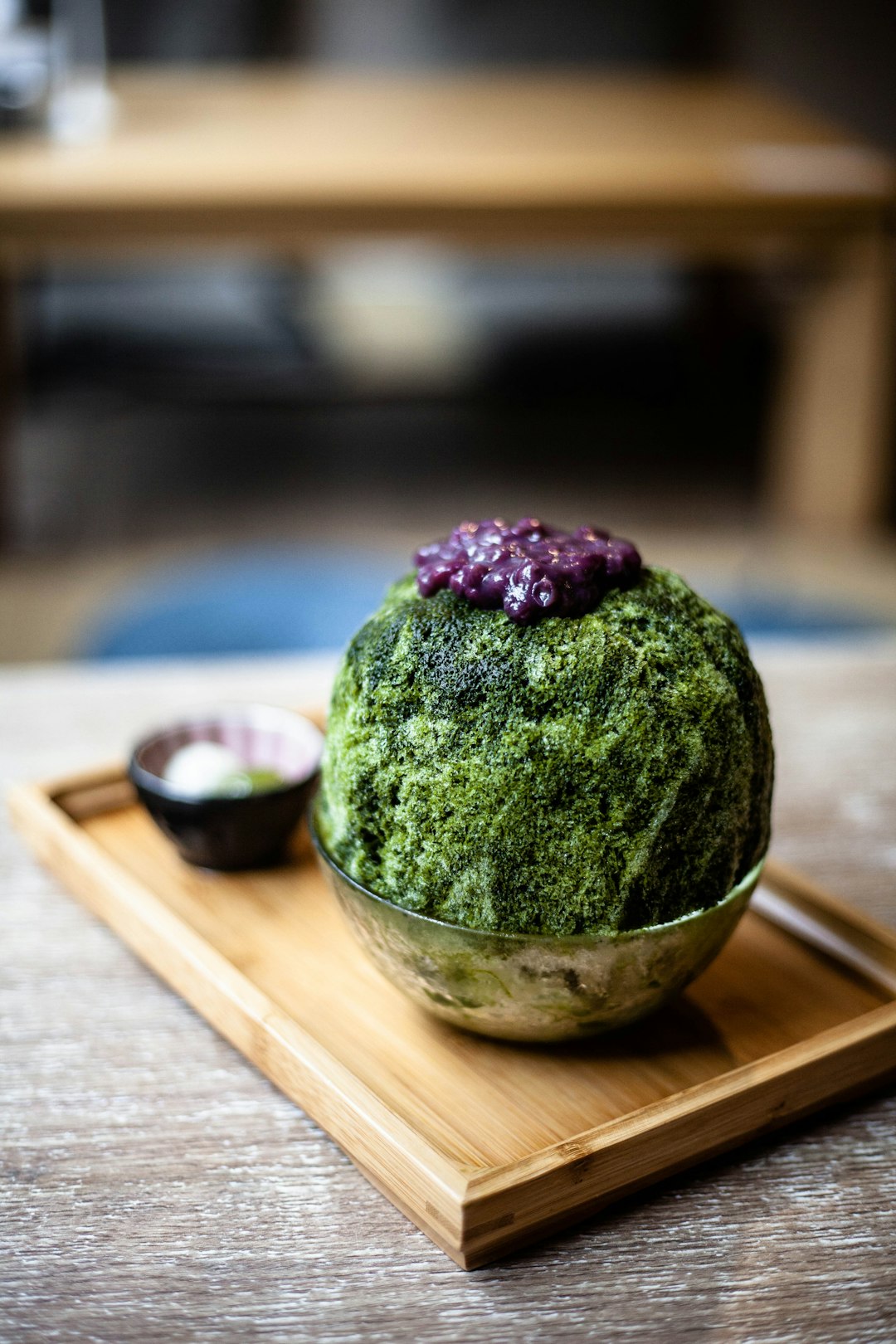 avocado ice cream with toppings in bowl