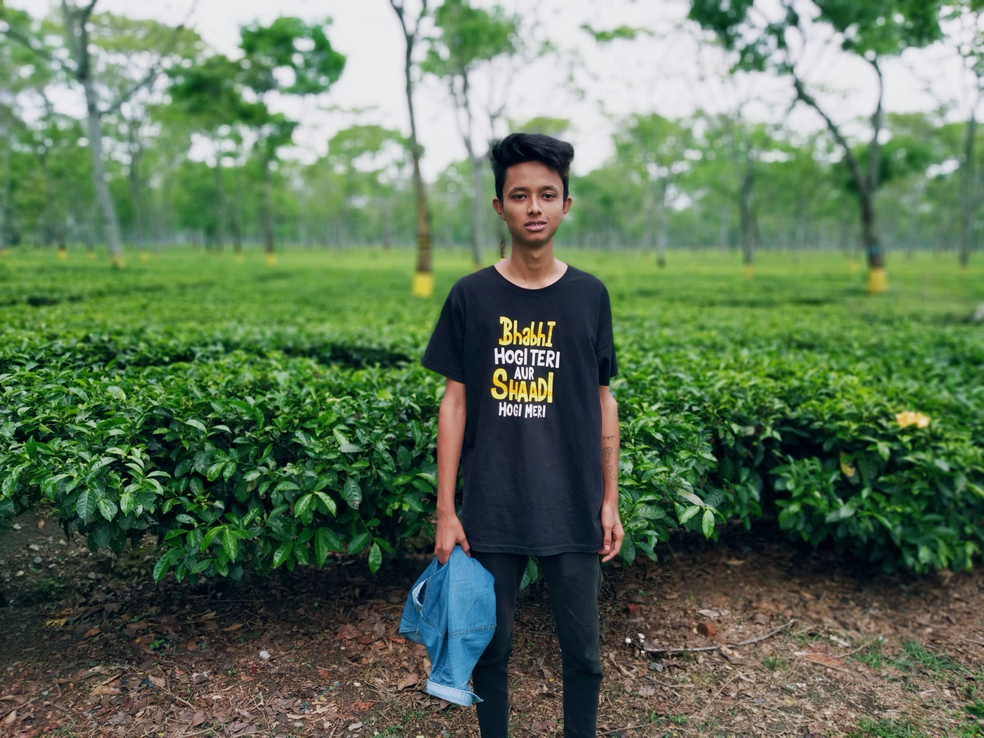 man standing near plants