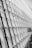 A geometric and abstract interior design featuring a series of diagonal lines created by metal beams and panels, suggesting a modern architectural structure. The composition emphasizes symmetry and perspective.