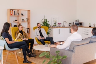 people seated in living room