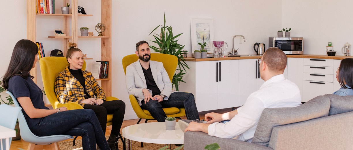 people seated in living room