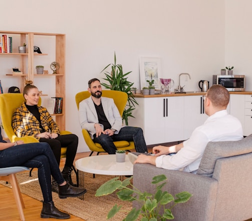 people seated in living room