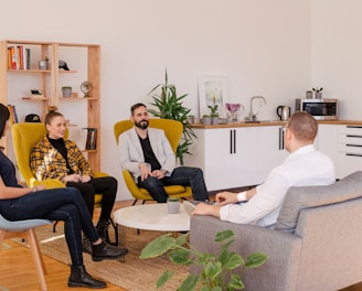 people seated in living room