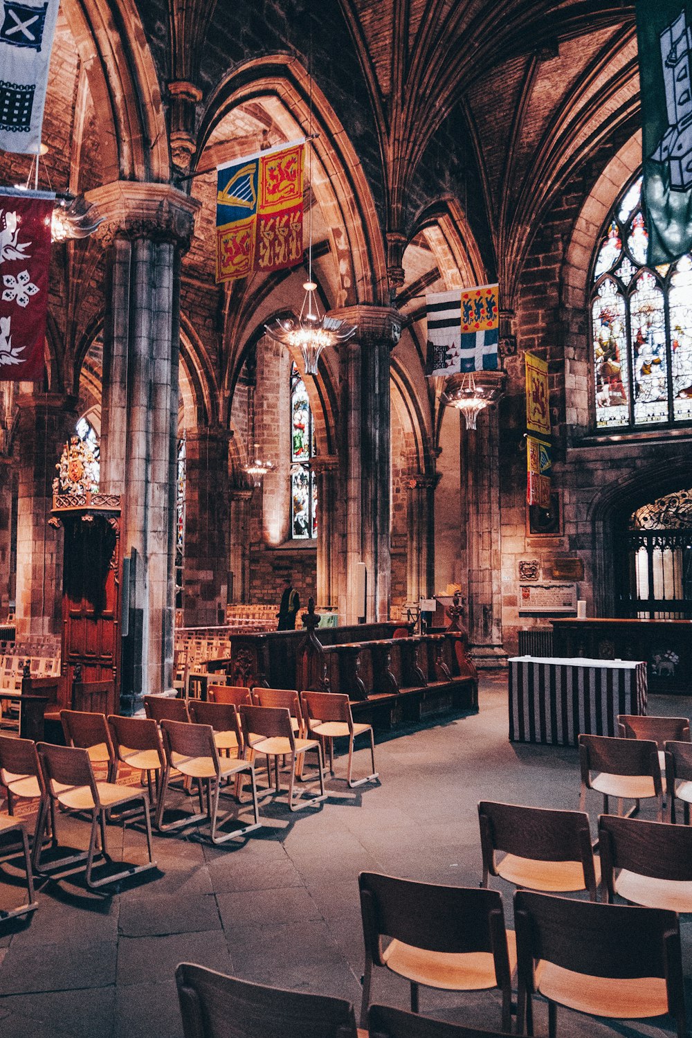 chairs near altar in the church