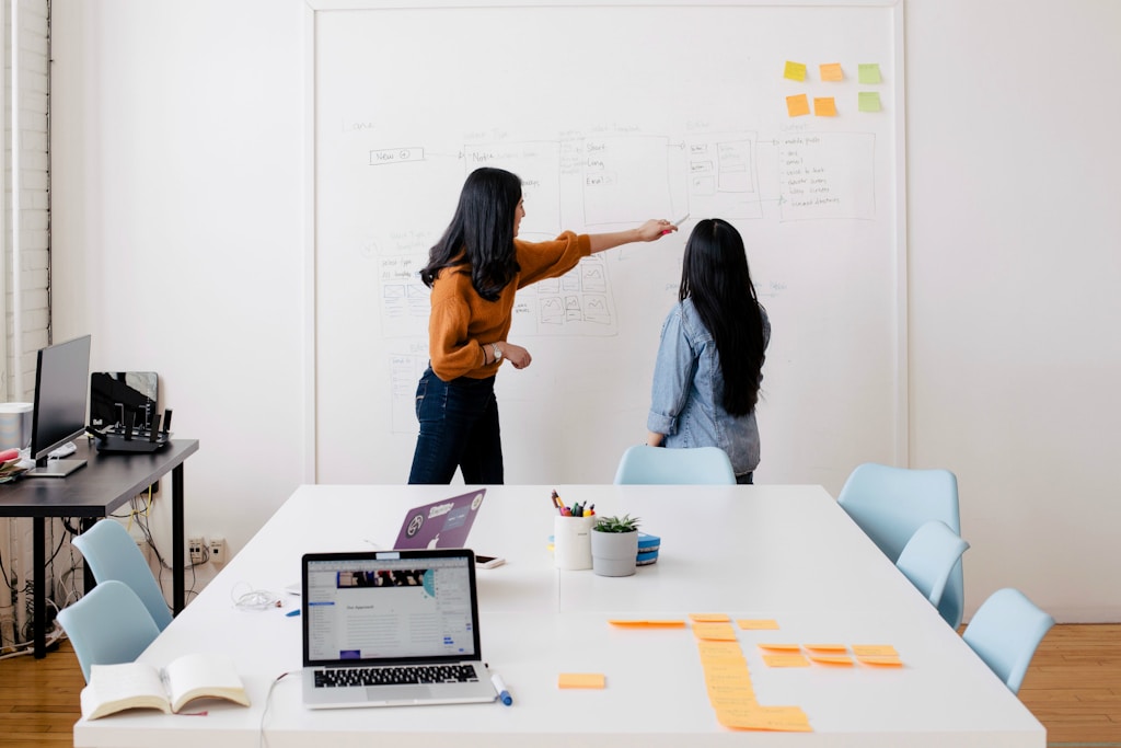 Two women working in an office.