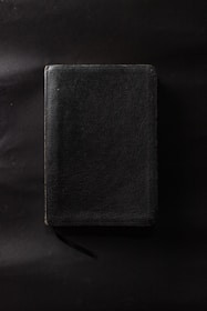 Close-up of the ebook cover 'already free' with amber accents on a dark background.