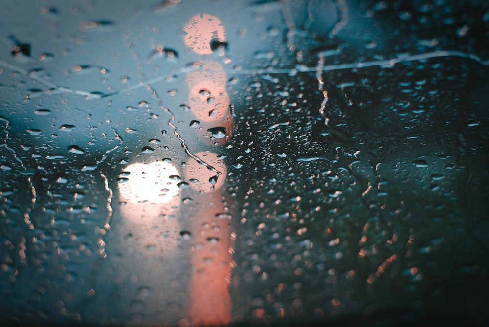 rain drops on the windshield of a car