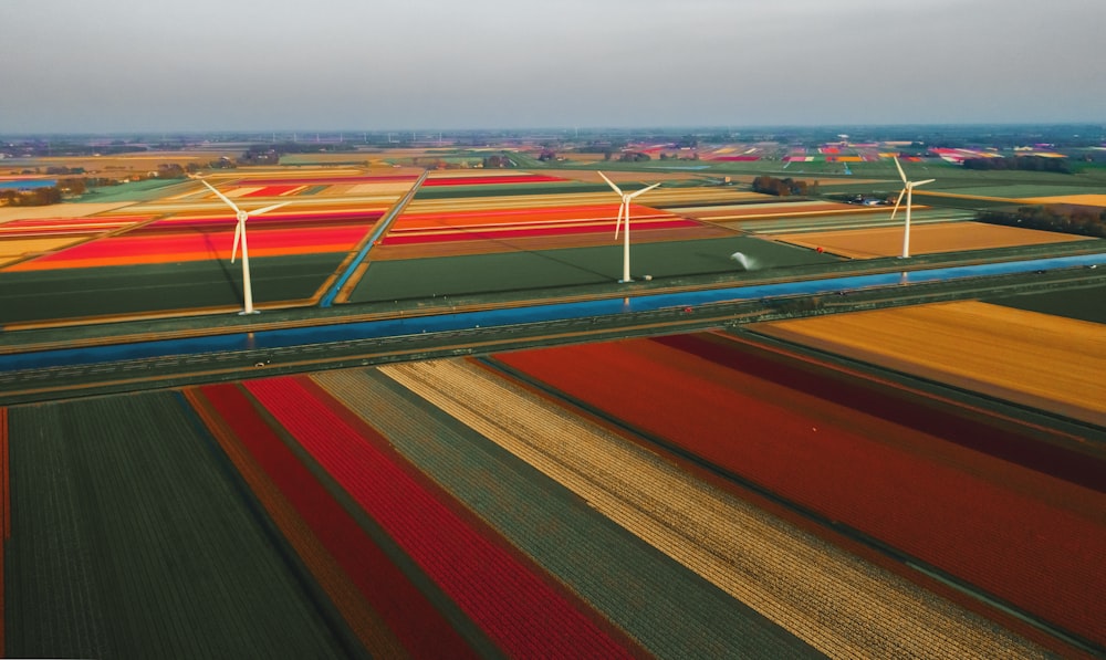 three white wind turbines