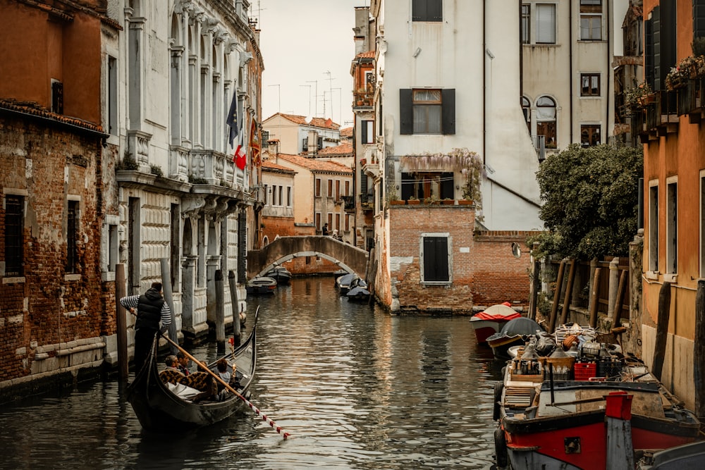 people riding on boat on body of water during daytime