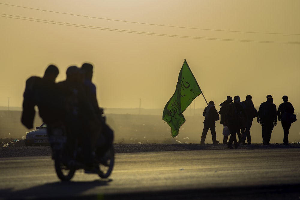 people holding flag